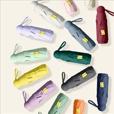 Mini capsule sun umbrella for sunny and rainy days